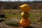 Mini pumpkins naturally balanced on top of one another.