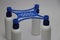 Mini quadcopter frame made using 3d printer supporting on small plastic bottles