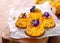 Mini spicy cheese cake with edible flowers
