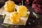 Mini stacks of potato gratin with cheese and rosemary, beautiful appetizer