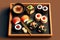 mini sushi set with rolls rice pasta miso on tray