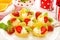 Mini tartlets with whipped cream and fruits