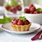 Mini tarts with raspberries fruits