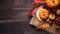 Mini thanksgiving pumpkins on wooden table