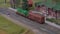 Mini Train Station Modelling. Model of Railway Station With Moving Train. Toy Train Models on Railroad Set Mockup