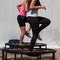 Mini Trampoline Workout: Girl doing Fitness Exercise in Class at