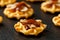 Mini waffle duck party food on rustic stone background