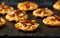 Mini waffle duck party food on rustic stone background