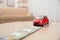 Miniature automobile model and money. Car buying