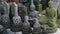 Miniature Borobudur temple stupa and stone statue for sale at local market