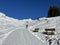 A miniature cemetery covered with fresh snow next to Arosa\\\'s mountain chapel (Das Bergkirchli Arosa)