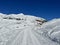 A miniature cemetery covered with fresh snow next to Arosa\\\'s mountain chapel (Das Bergkirchli Arosa)