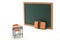 Miniature chalkboard and school desk on white background.