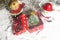 Miniature Christmas Santa cros and Tree on snow over blurred bokeh background,Decoration Image for Christmas Holiday and Happy New