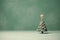 Miniature Christmas tree minimalistic trendy composition.AI generated