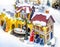 Miniature Christmas village scene. Christmas decorations toys.