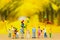 Miniature family: Childrens playing balloon together. Image use for background International day of families concept