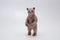 Miniature figure, bear made from plastic isolate on a white background