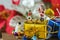 Miniature figure Santa claus standing on big golden present gift