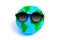 Miniature Globe in Sunglasses on White