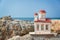 Miniature greek orthodox chapel by the sea near Chania in Crete Greece