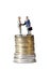 Miniature handshake euro coin tower