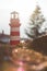 Miniature lighthouse with sun flares