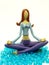 Miniature model in a yoga position