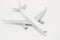 Miniature passenger airplane on white background.