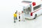 Miniature people : ambulance for treatment of patients far from medical facilities. Image use for health care concept
