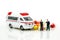 Miniature people : Businessman with Ambulance and capsule drug,Business of Medicine ambulance healthcare concept.