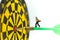 Miniature people: businessman on dart arrow hitting in the target center of dartboard,Target business, achieve and victory concept