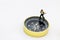 Miniature people: Businessman standing on compass. Business solutions, success, strategy and Solving problems concept