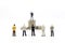 Miniature people : Businessman standing front of stack of coin. Image use for financial, business vision concept