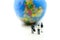 Miniature people : Businessman standing with Global World map ba