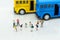 Miniature people : Children,students going to school with school bus. Image use for back to school, education concept