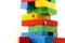 Miniature people : climbing colorful wooden block with challenging route on cliff, Concept of the path to purpose and success.