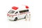 Miniature people : Doctor and Nurse emergency medical team with pills and Ambulance ,Health care, medical service, and insurance