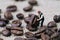 Miniature people figurine coffee professional worker holding roa