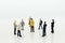 Miniature people: Group businessman negotiates business, planning. Image use for business concept