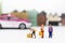 Miniature people: Group people are moving suitcase and waiting for buses. Image use for Transportation, Travel business concept