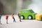 Miniature people : Group of traveler standing on road for hopping find passing car carrying to transfer