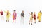 Miniature people: Group of women standing together, used to announce the International Working Women`s Day.