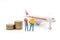 Miniature people,husband and wife standing with airplane and sta