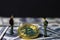 Miniature people small figures businessmen standing and talk about business between Golden bitcoin on one hundred dollar banknotes