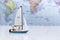 Miniature people: Tourists with sports sailing. Image use for travel business concept