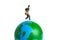 Miniature people toy figure photography. Study abroad and educational ceremony concept. A Young men pupil running above earth