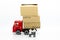 Miniature people : Truck with box in warehouse. Image use for business, industrial and logistic concept