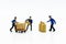Miniature people: Workers help to moving crates . Image use for delivery, business concept