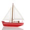 Miniature red sail boat